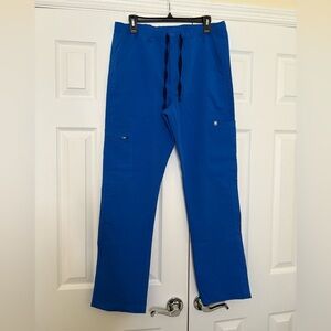 Used royal blue Figs scrub pants. Size medium. Technical collection.